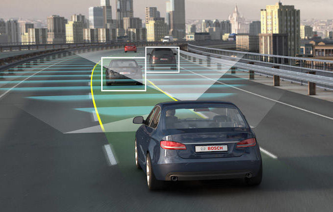 Virtual reality image of cars driving on the road.