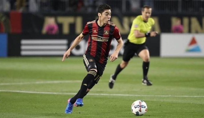 Miguel Almiron out on the soccer field.